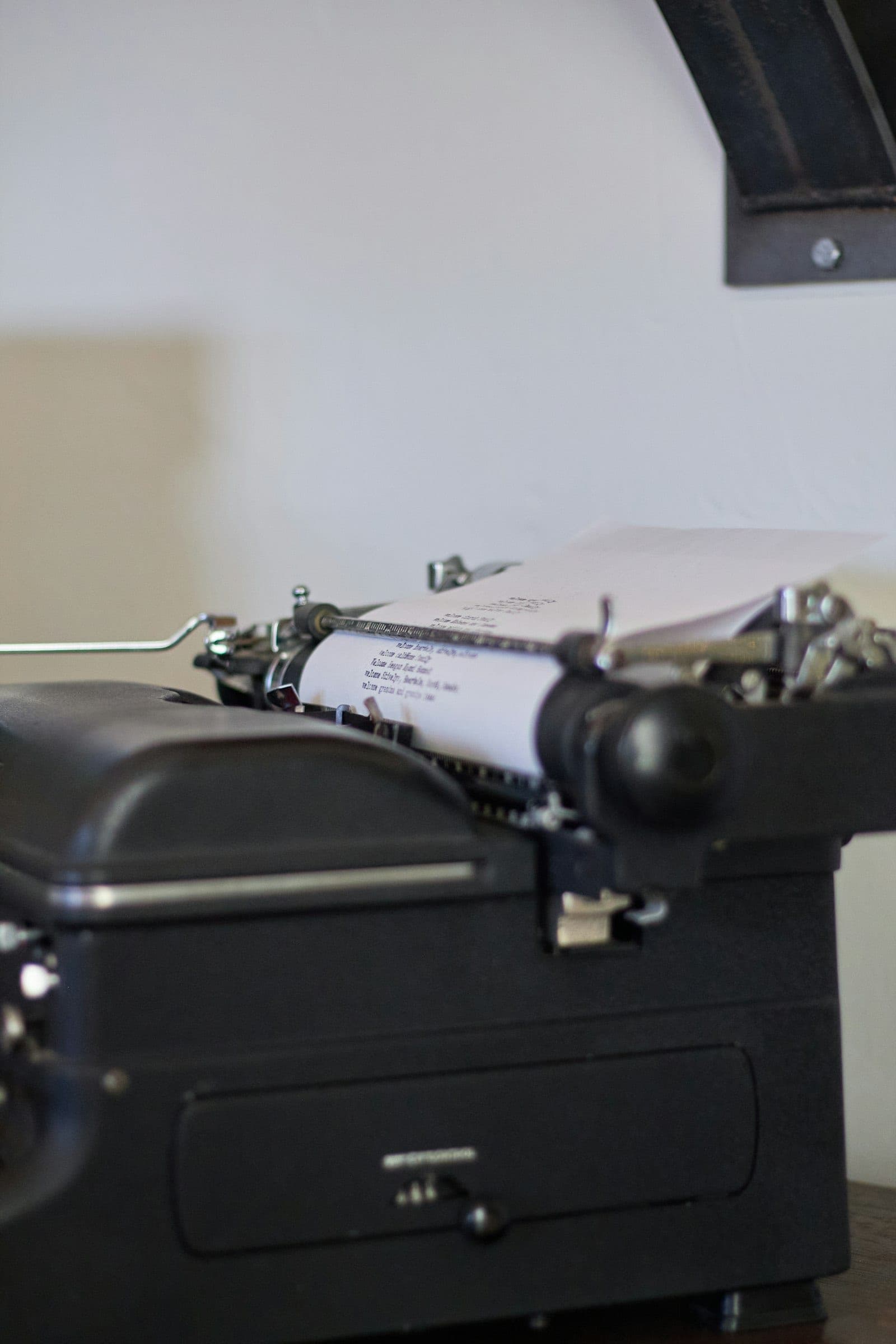 A vintage typewriter with paper