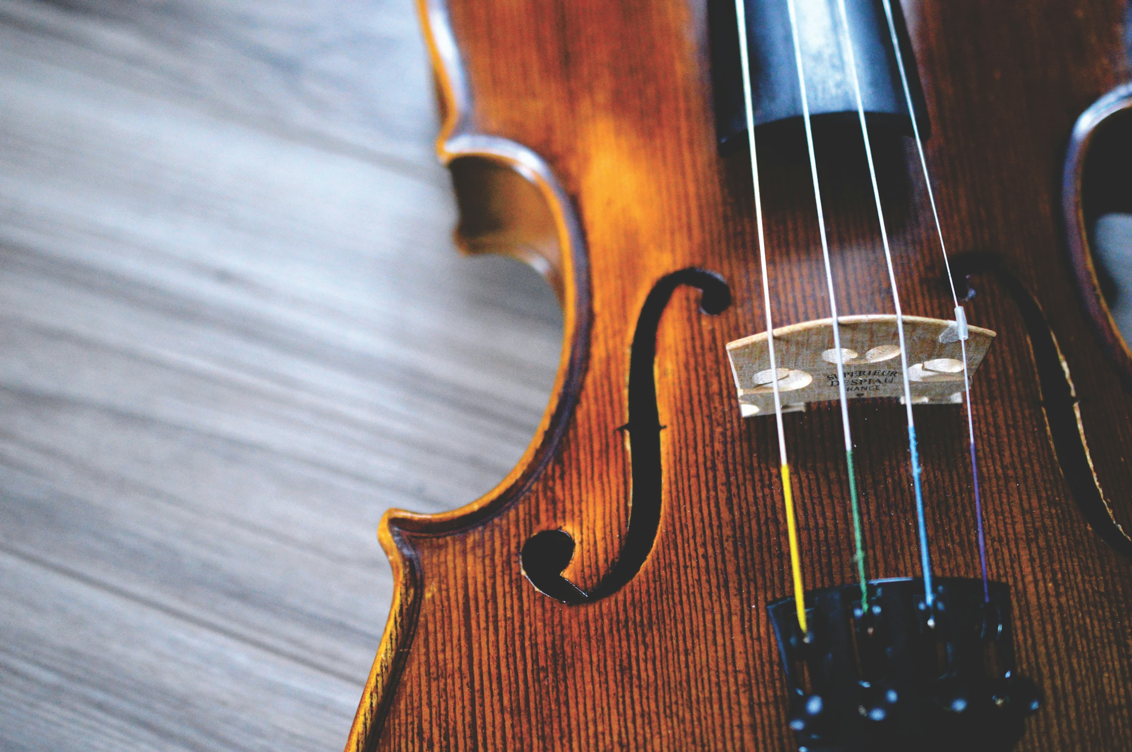 Close-up of a violin f-hole and body
